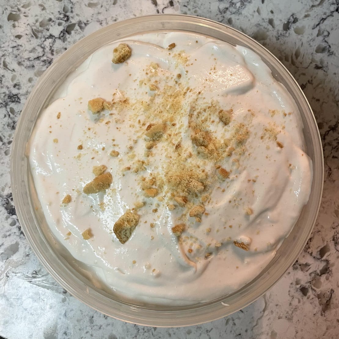 Top-down shot of a bowl of banana pudding.