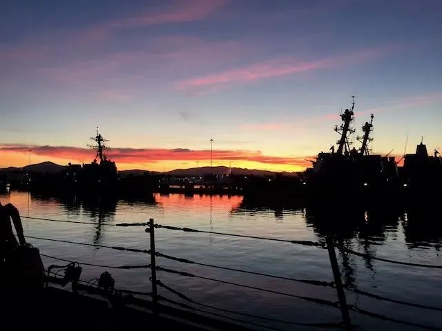 Ships moored in San Diego at sunrise.