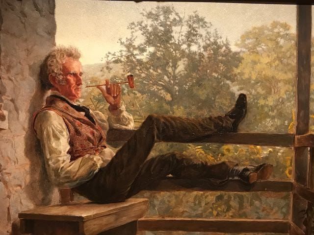 Painting of a man relaxing on his porch with a corn cob pipe.