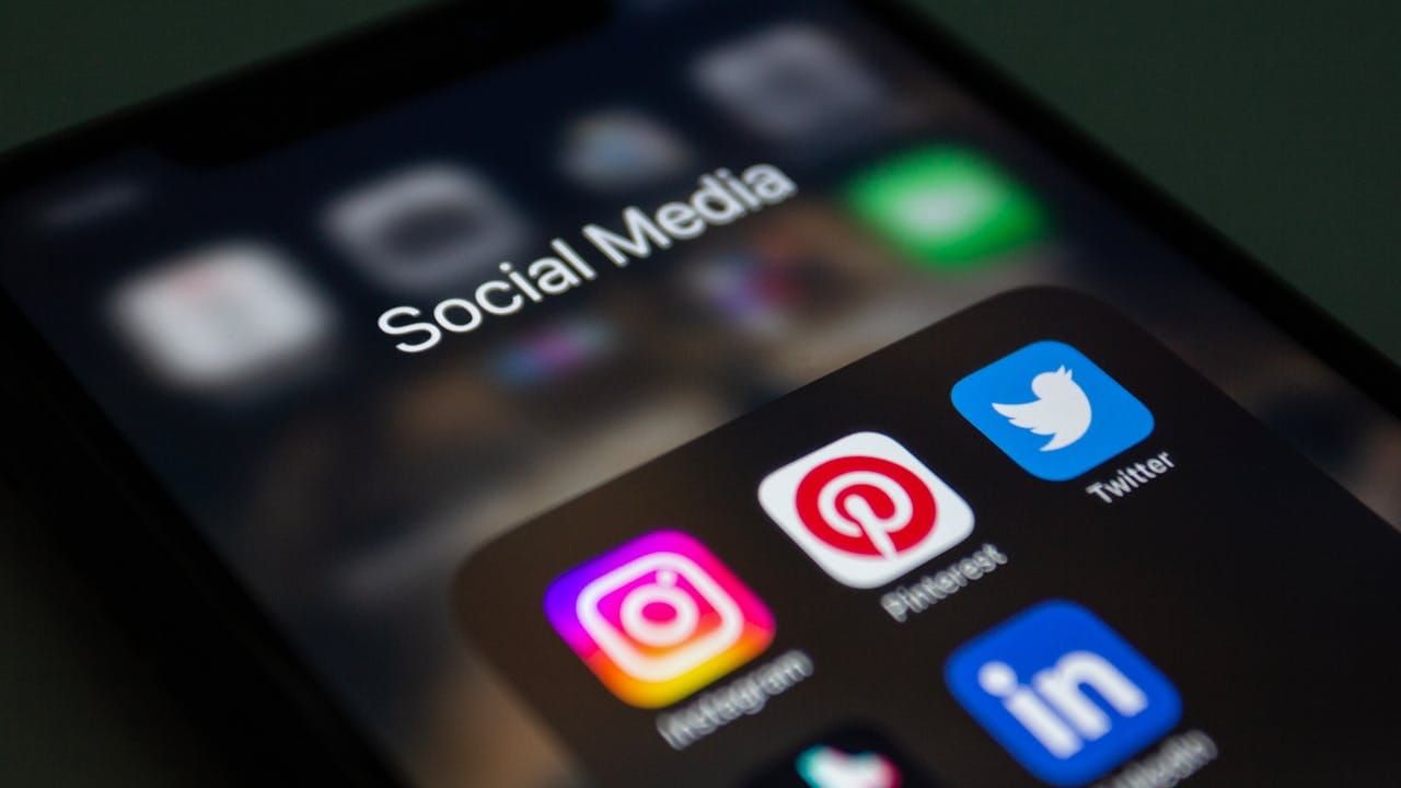 A smartphone screen displaying popular social media applications.