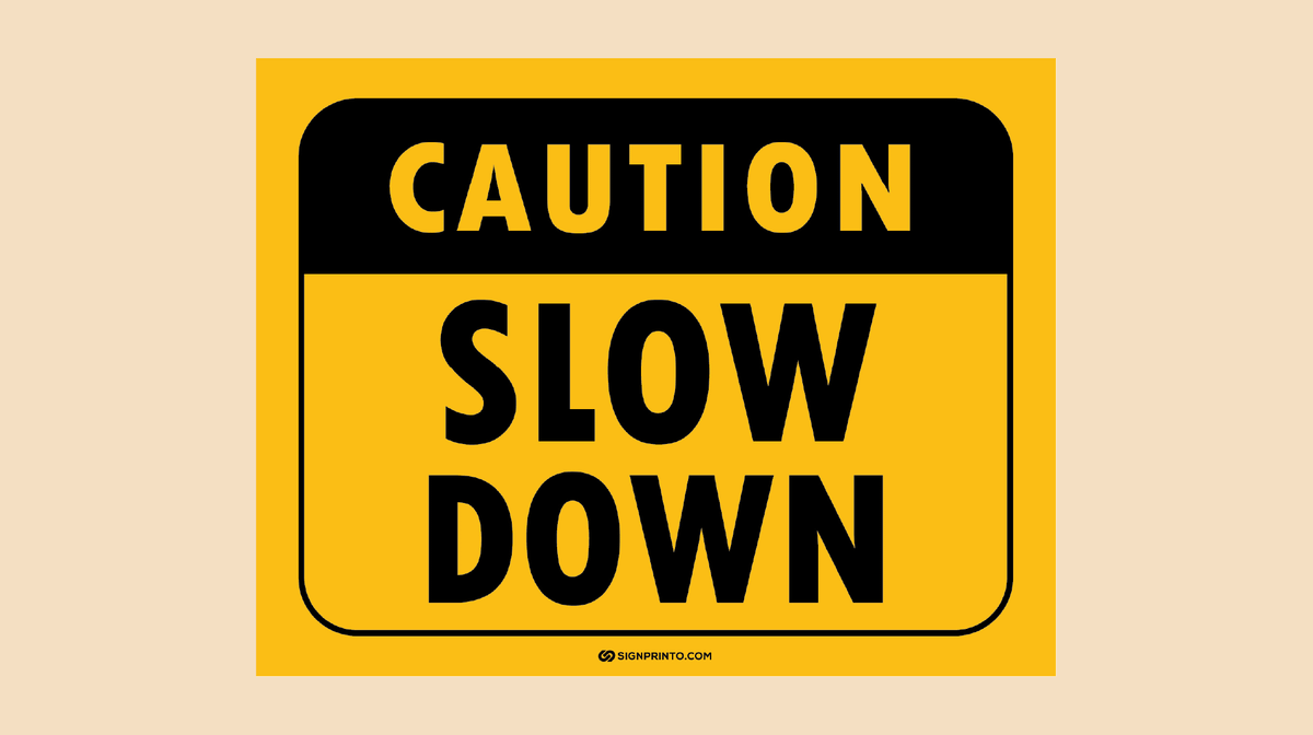 Caution Slow Down Sign