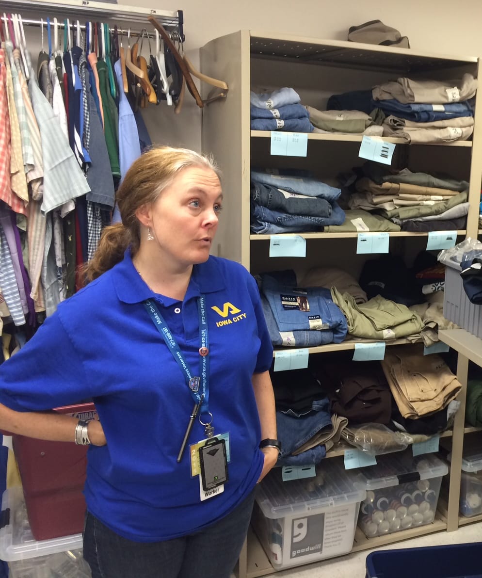 Sarah Oliver, homeless program coordinator in summer 2016, shows the clothing pantry at the Veterans Administration Homeless Outreach Center in Rock Island, Illinois, on June 9, 2016. 