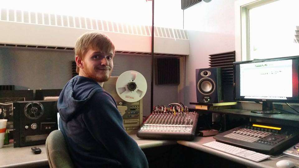 Buena Vista University junior Jacob Amhof in a vocal recording booth at school. He is seeking a vocal performance and music production double major while also dealing with autism.