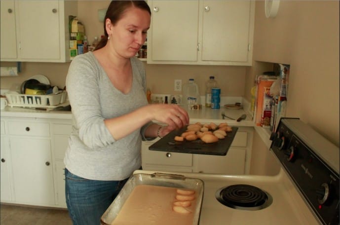 Anna Kolpakova, of Slovakia, makes cookies in her kitchen in Iowa City while her husband, David Pisa of the Czech Republic, does post-doctoral work at the University of Iowa in fall 2013. Koplakova has put her career as a physicist on hold while her husband works in Iowa.