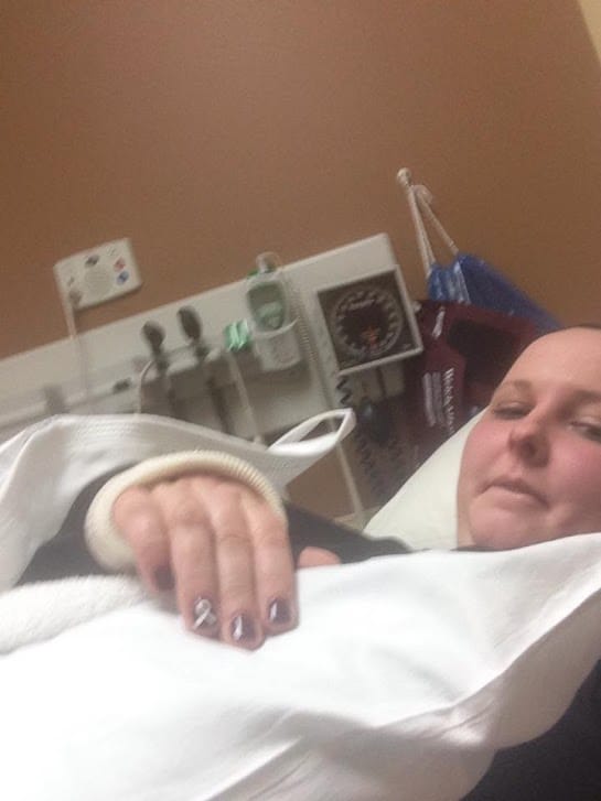 Katie Anthony recovers in a hospital emergency room with a broken wrist in this undated photo.