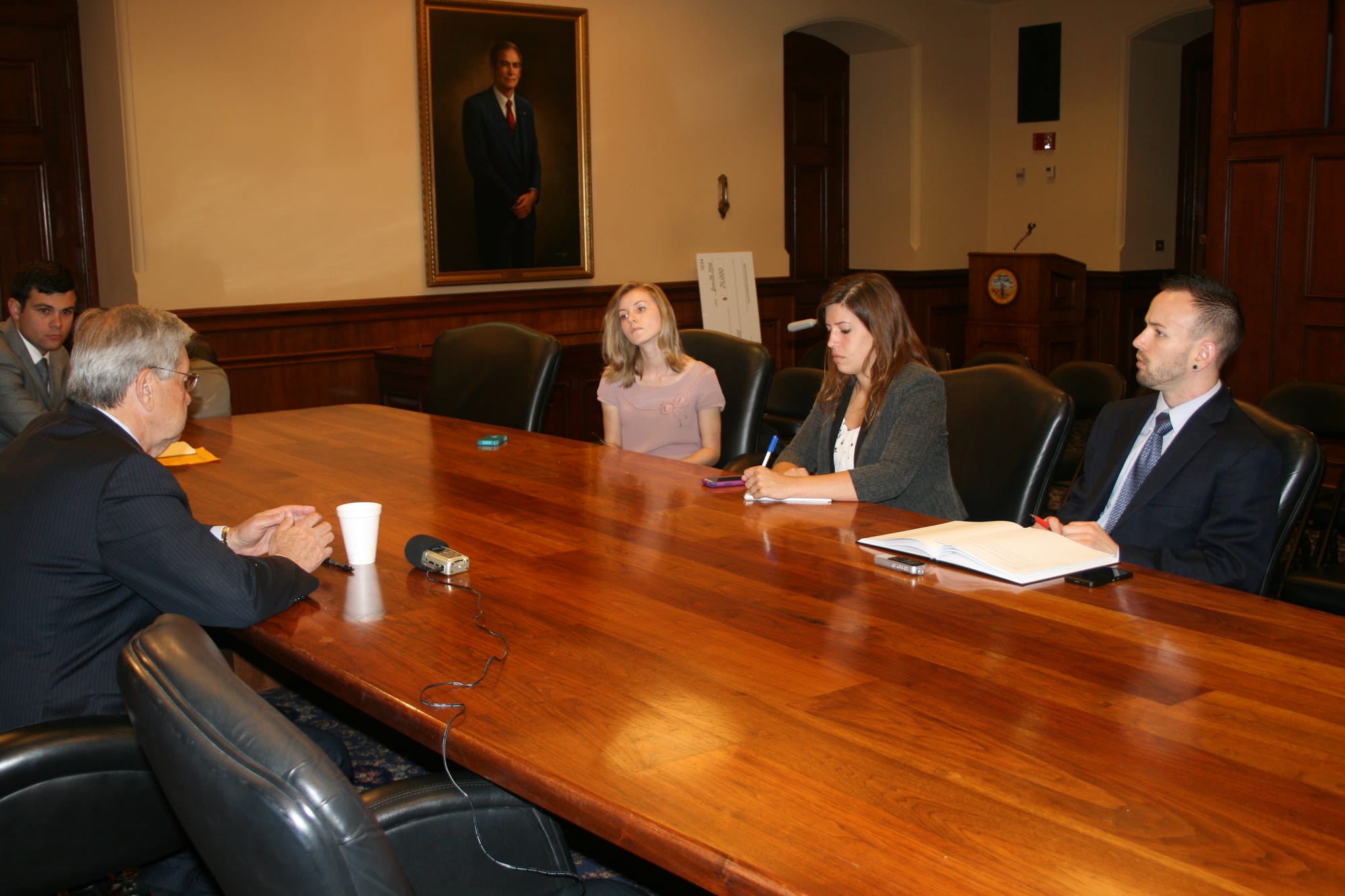 Iowa Gov. Terry Branstad was interviewed by IowaWatch reporters (left to right) Sarah Hadley, Amber Rouse and Jacob Luplow on July 7, 2014.
