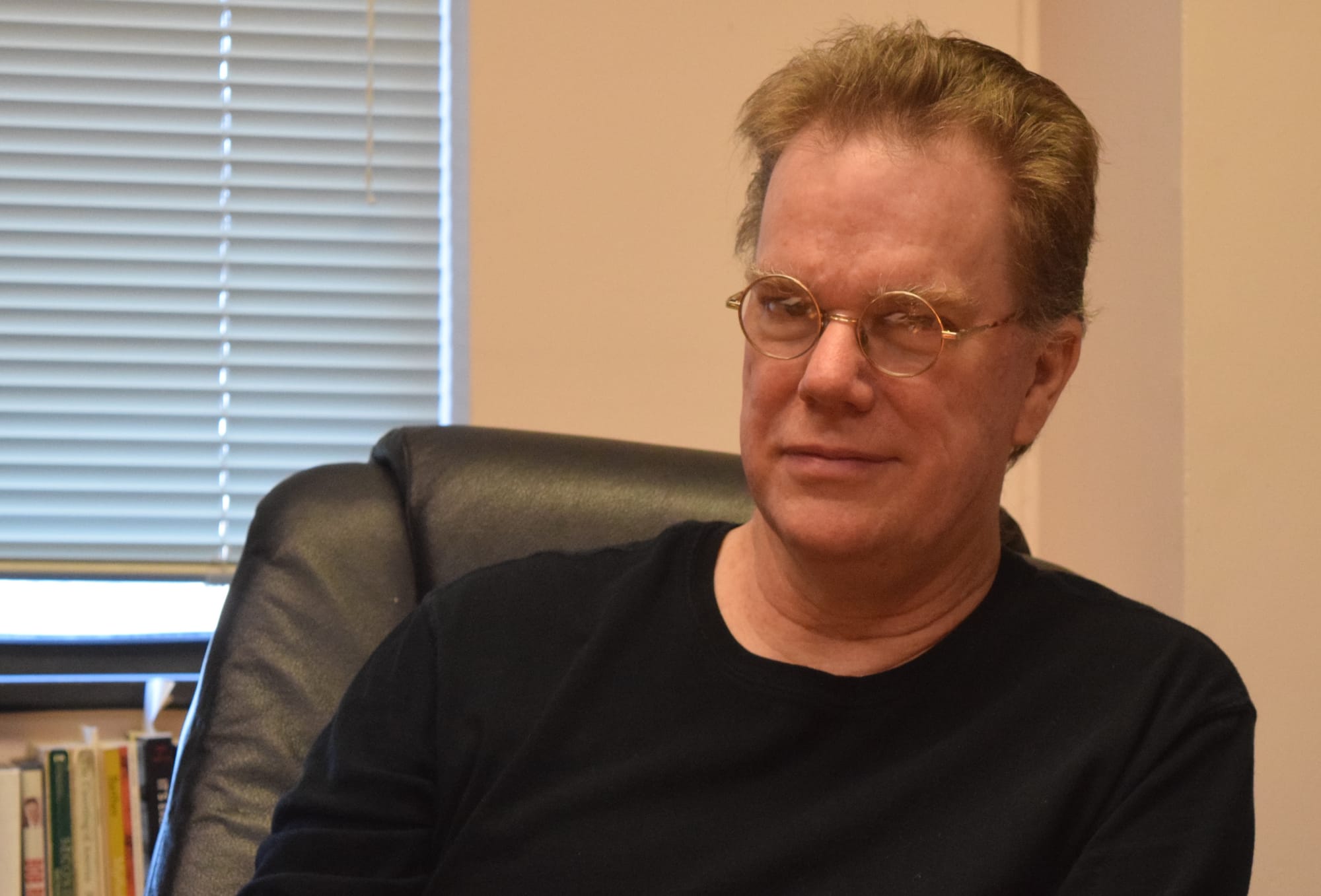 Dirk Deam, senior lecturer for political science, at his Iowa State University office in spring 2016.