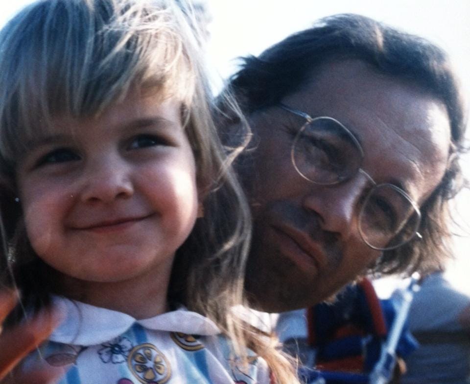 Emily Funk as a child with her father, Ruben Funk, of Davenport. Ruben Funk died in Emily's senior year of high school but left money for her to attend Iowa State University debt free.
