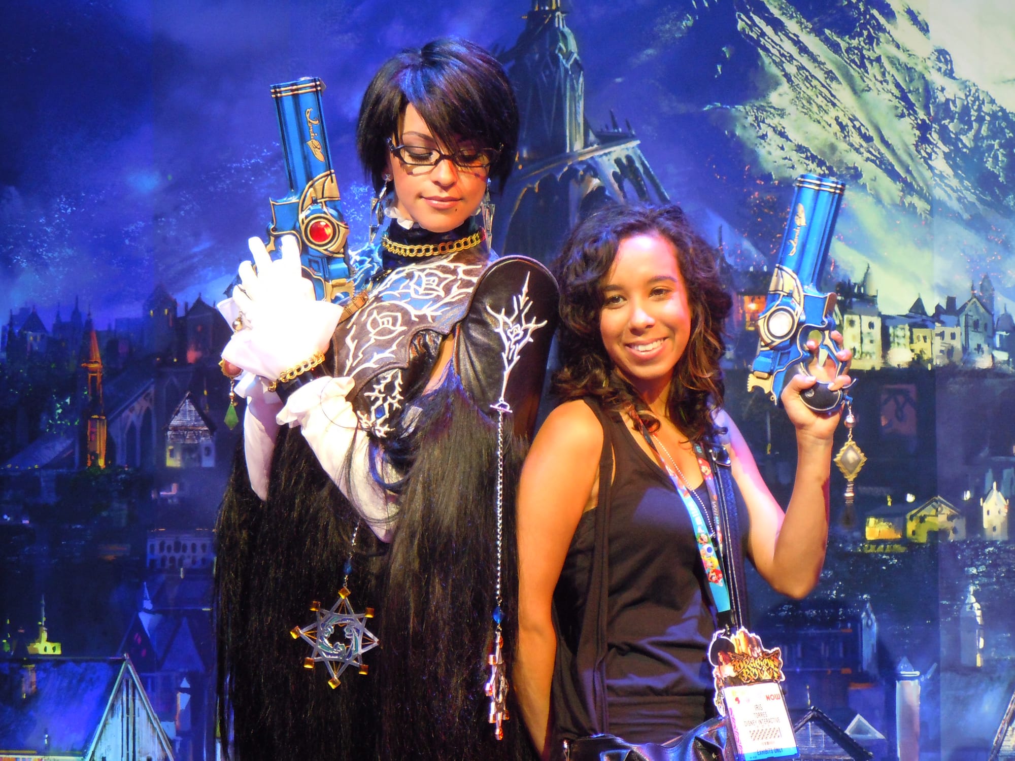 A professional cosplayer of Bayonetta (left) and fan at Electronic Entertainment Expo (E3) in Los Angeles in June 2013. Cosplayers create costumes of their favorite characters and dress as them.