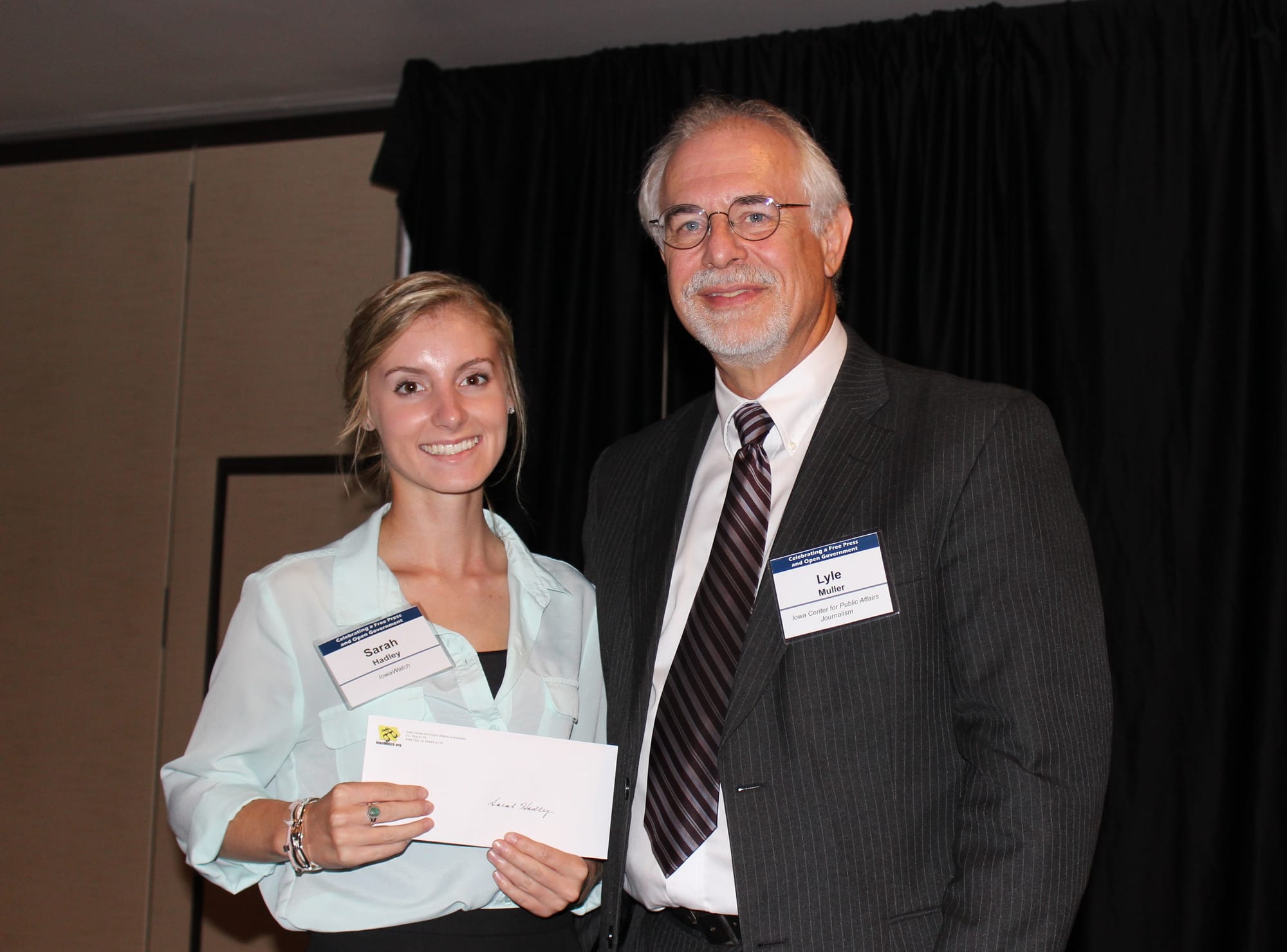 IowaWatch reporter Sarah Hadley receives the 2014 IowaWatch/Fotini Perlmutter Undergraduate Student Award on Oct. 2, 2014.
