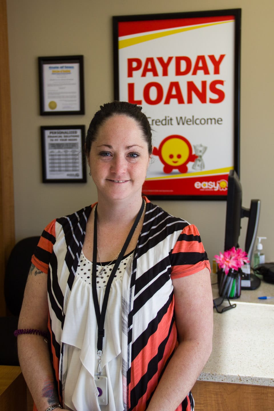 Amber Castle, an employee at Easy Cash Solutions in Cedar Rapids shown February 26.
