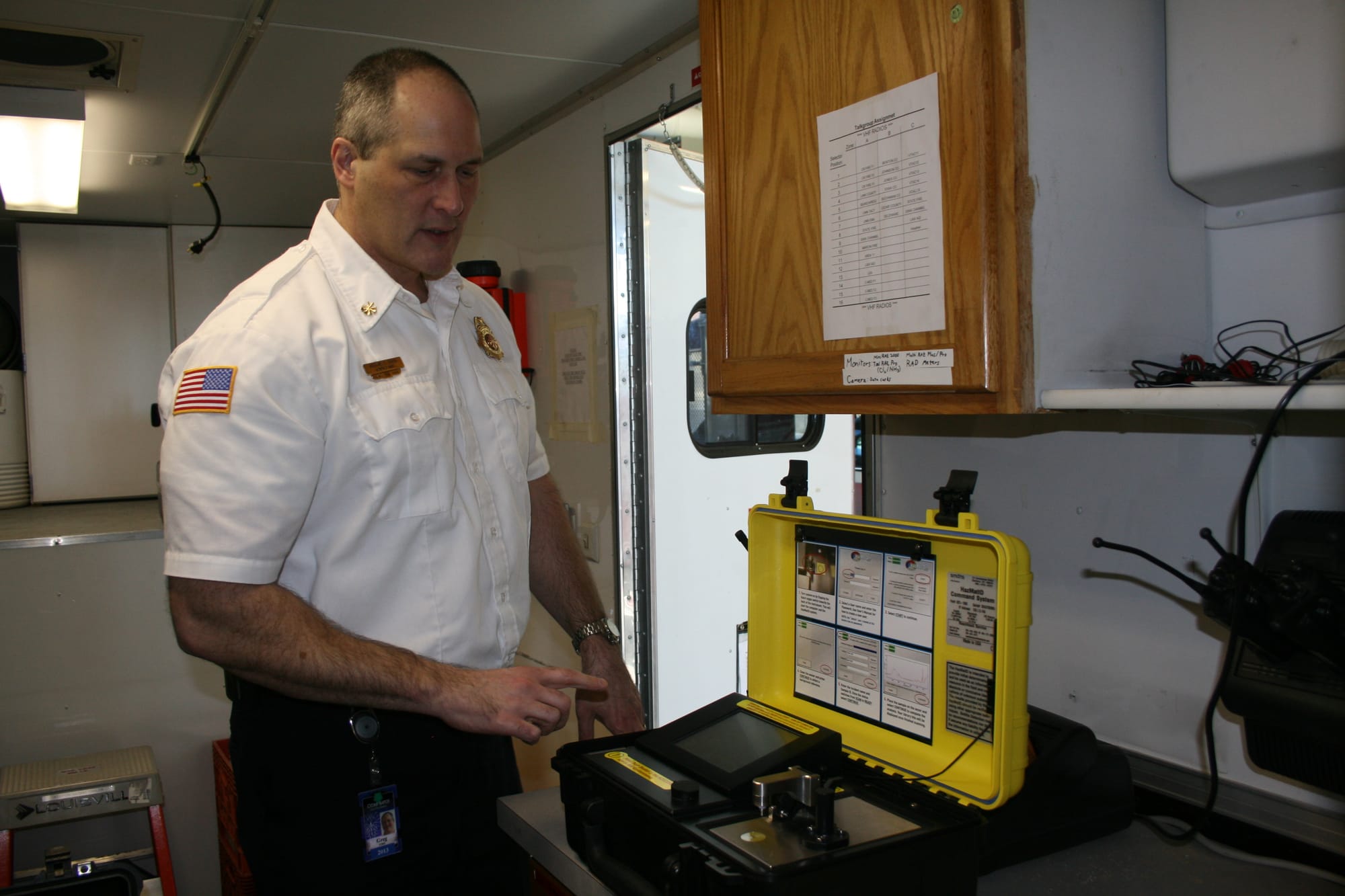 Greg Smith, Assistant Fire Chief for the Cedar Rapids Fire Department, demonstrated an instrument used for onsite chemical analysis during a hazmat emergency response.