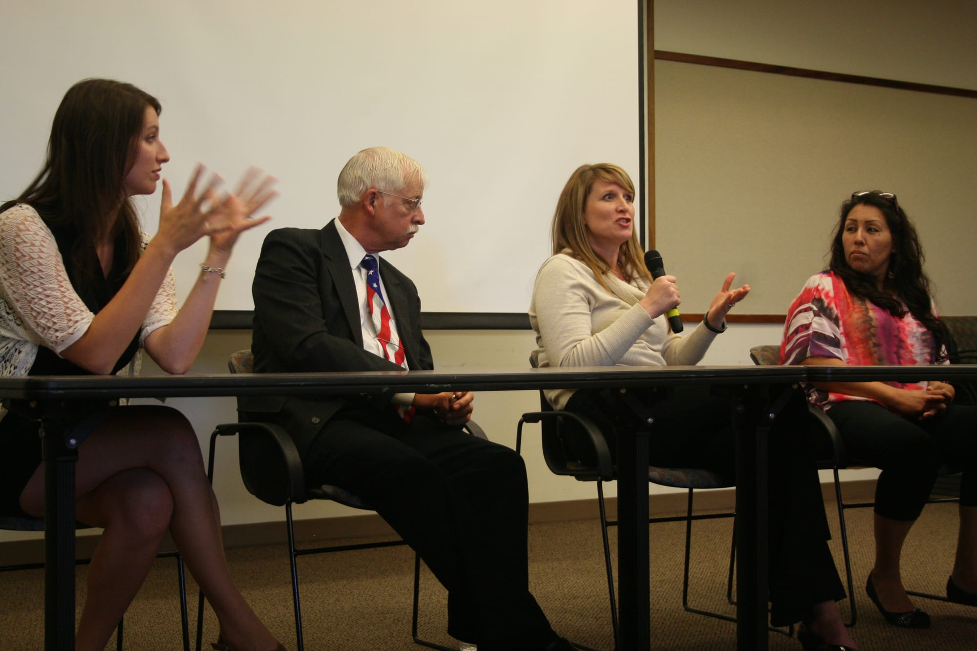 Panelists talk about curbing meth abuse at a July 1 IowaWatch/Council Bluffs Nonpareil forum in Council Bluffs. Left to right are: Katie Kuntz, producer of an IowaWatch documentary 'Breaking the Cycle: Meth Addiction in the Heartland'; 4th Judicial District probation officer Keith Roman; Alegent Creighton Health Director Haley Ehlers; and addiction treatment counselor and recovering meth addict Glennis Guerrero.