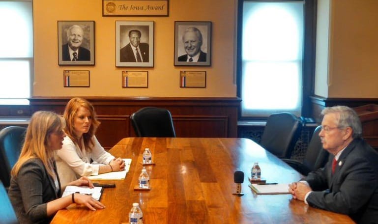 IowaWatch summer 2015 interns Makayla Tendall (left) and Clare McCarthy interview Iowa Gov. Terry Branstad in July 2015.