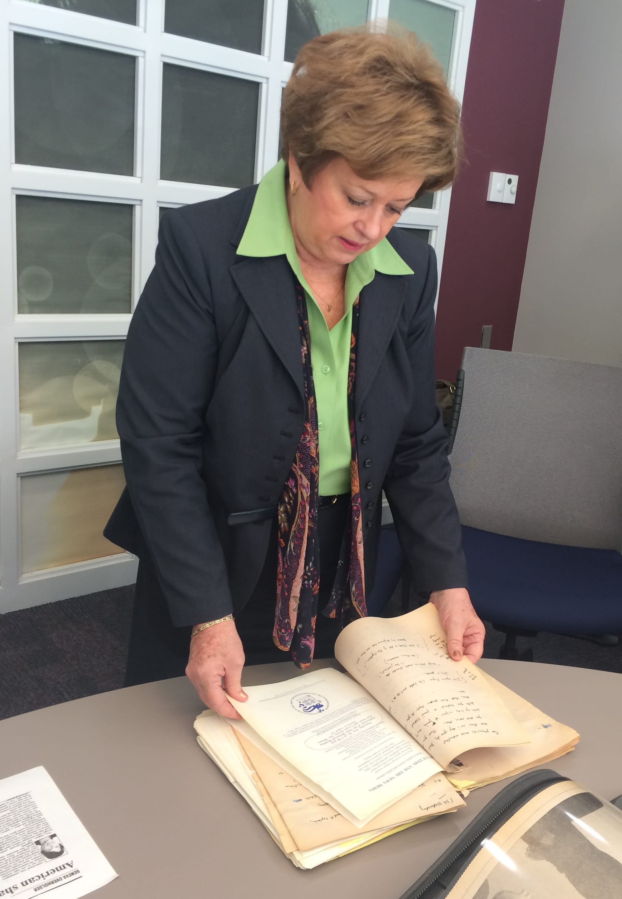 Former Des Moines Register reporter Jane Schorer Meisner looks through the notes she's saved from a 1990 series about an Iowa rape that won her and The Des Moines Register the 1991 Pulitzer Prize for Public Service. Photo taken March 14, after an IowaWatch interview at Iowa Public Television's Johnston, Iowa, studios.