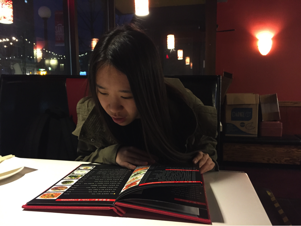 University of Iowa senior Jia Yuanfang, from Hebei, China and studying business and art, at Food Republic, a downtown Iowa City restaurant, in early December 2015. Jia says she has had trouble understanding professors because they use words and sayings she doesn’t know.