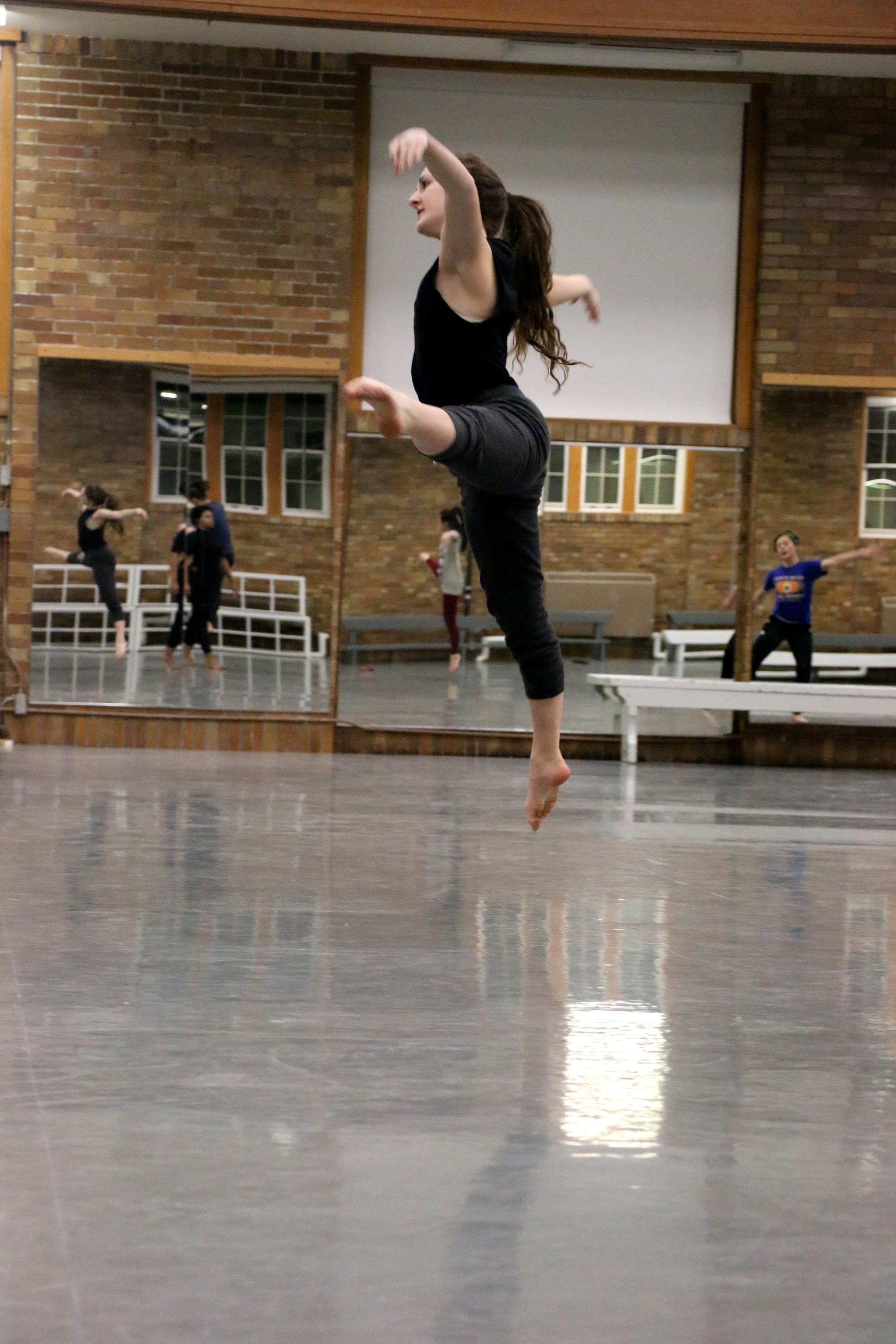 Julianna Feracota, a University of Iowa sophomore studying dance and accounting and member of the 2016 Dancers in Company troupe, gets some air during a Thursday, Feb. 11 rehearsal.