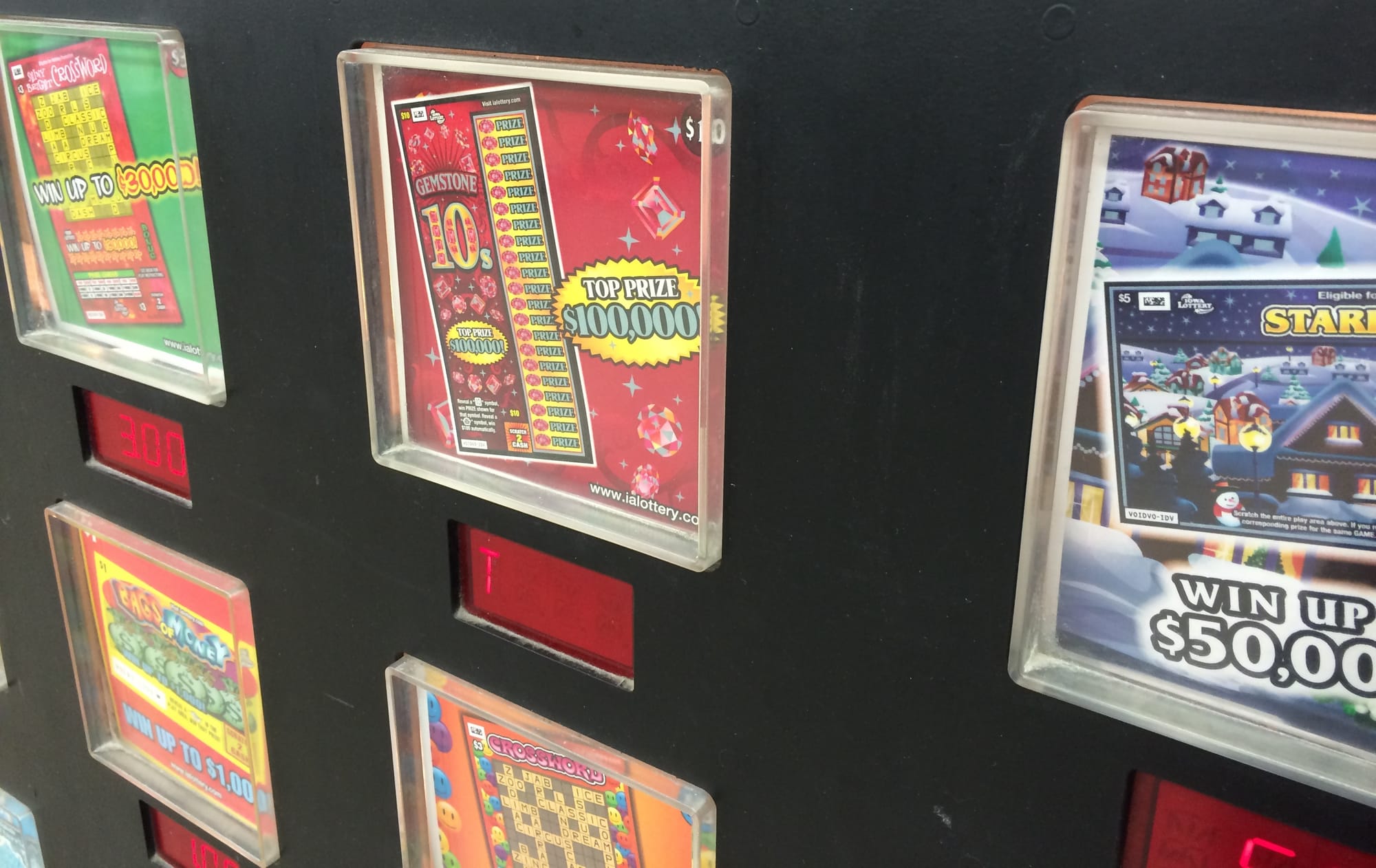 Vending machines dispense a variety of Iowa Lottery scratch ticket games at retail outlets.