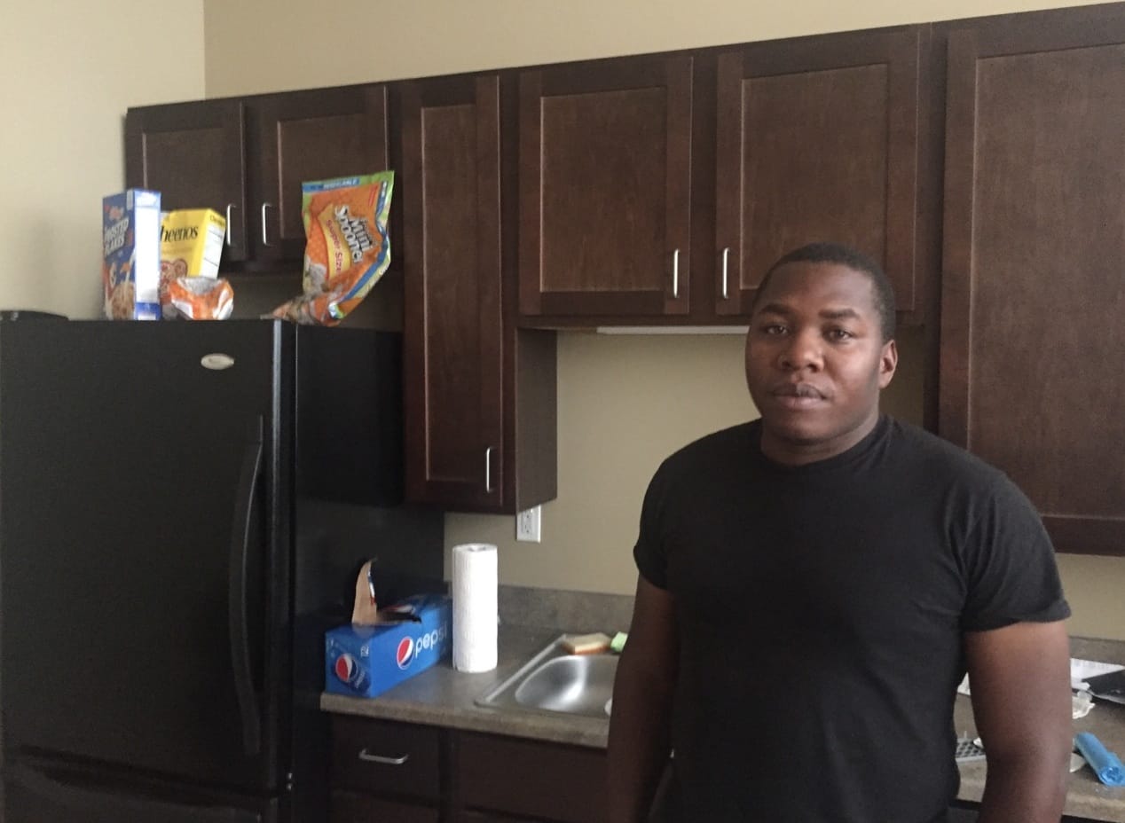 Marine Corps veteran Michael Washington in the kitchen of an apartment he was able to find in Davenport. Photo taken July 20, 2016.