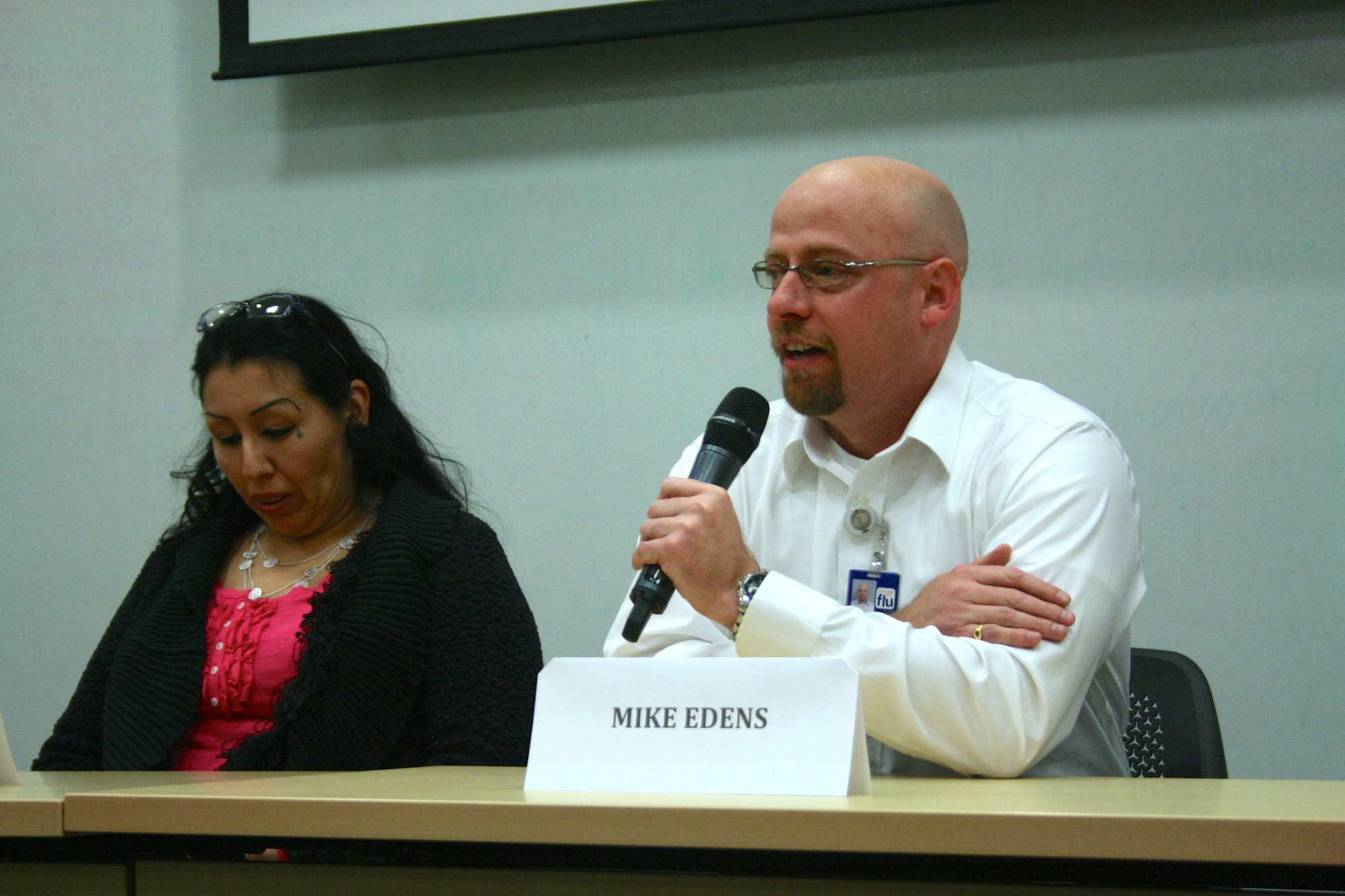 Mike Edens, a counselor at Powell Chemical Dependency Center of Des Moines, speaks at the Register Media Community Room Nov. 19, 2014, about the need for meth addiction treatment in the criminal justice system. Left of Edens is Glennis Guerrero, a recovering meth addict from Council Bluffs who now helps others recovering from drug addiction.