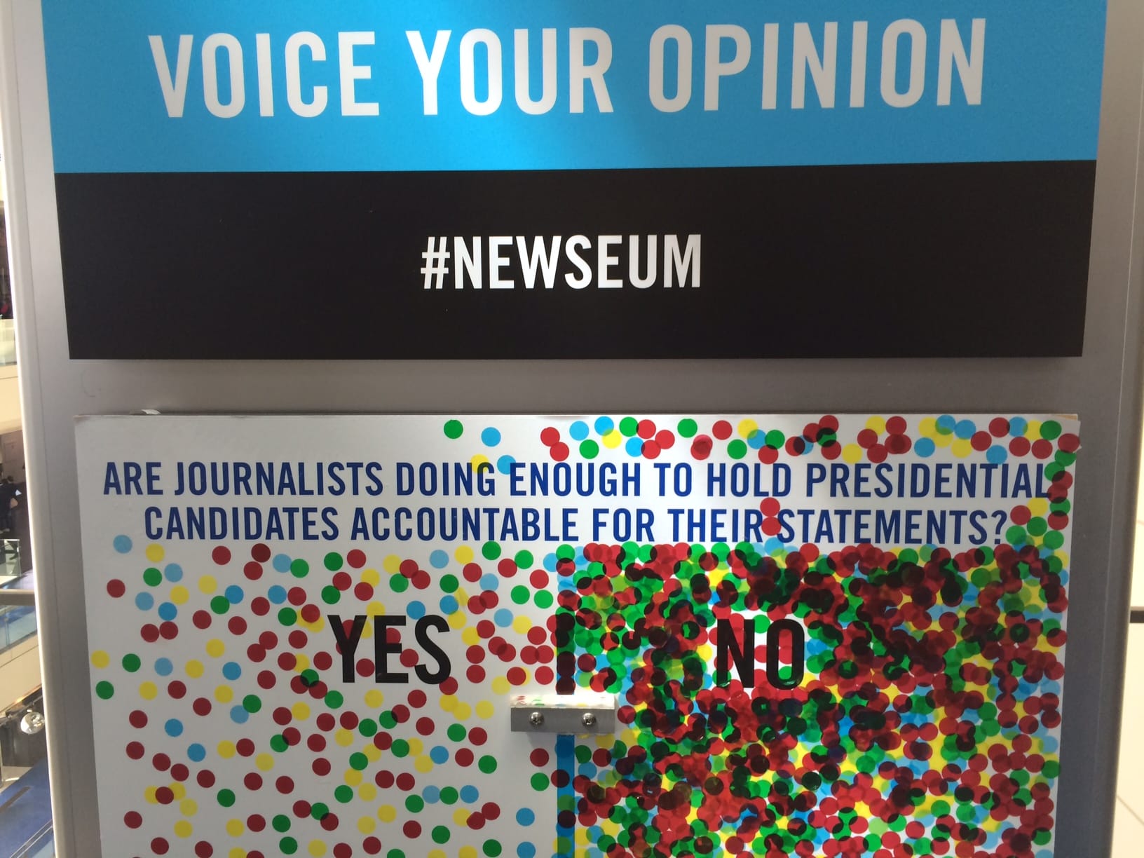 Visitors to the Newseum Institute in Washington, D.C., voice their opinion about whether or not journalists are doing enough to hold presidential candidates accountable when reporting their statements. The informal result when this photo was taken April 3, 2016, overwhelmingly was no.