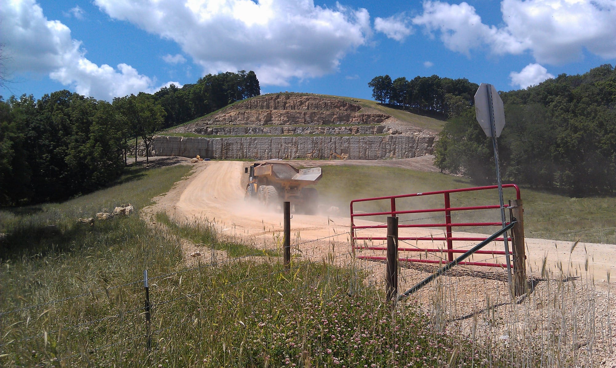 A truck enters a rural spot near Clayton, Iowa, on June 24, 2014, where Pattison Sand Company was preparing to open a new mine in the side of a hill.