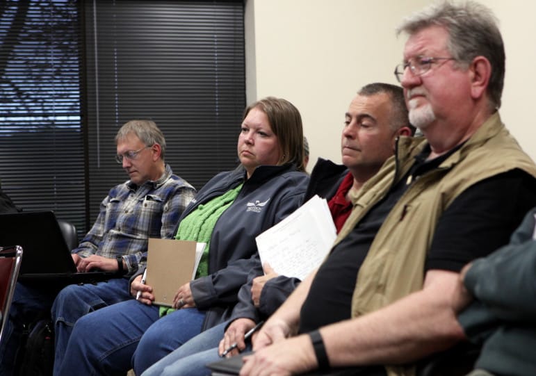 From left, Kyle Pattison, managing partner; Angela Sessions, public relations; John Hendrix, environmental compliance manager; and Tim Adkins, health and safety director, from Pattison Sand Mine at a meeting of the Mine Reserve Expansion Study Committee in Clayton Co., Iowa on April 28, 2016.