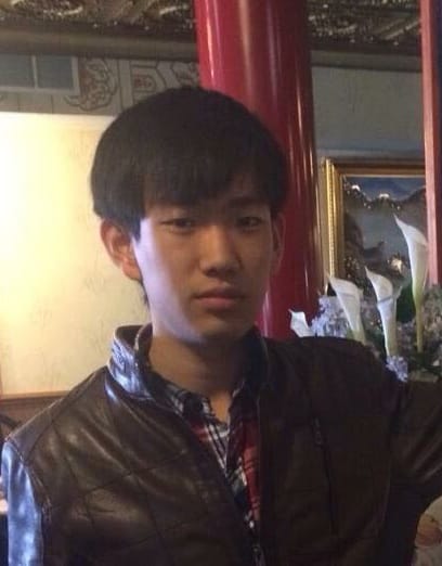 Qiudong Song is shown in a Chinese restaurant at DeKalb, Illinois, in this 2014 photo taken by a friend.