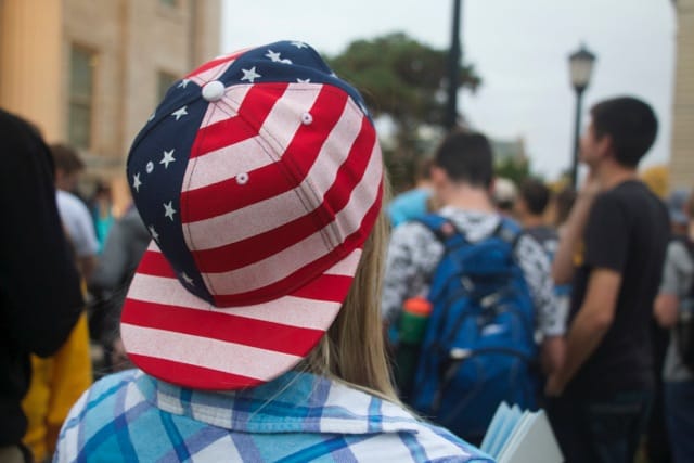 A spectator waiting to hear Republican presidential candidate Rand Paul speak on the University of Iowa Pentacrest on Oct. 12, 2015.