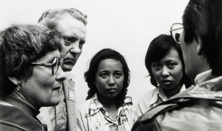 Seeing this Iowa Historical Society photo in an Iowa newspaper that published a Clare McCarthy IowaWatch story prompted Jeanne Buck Coburn to contact McCarthy. The picture shows Vietnamese refugees gathered in Des Moines in the 1970s with Coburn's parents, Eleanor and Wayne Buck of rural Melbourne, Iowa, who helped the refugees resettle in the state.