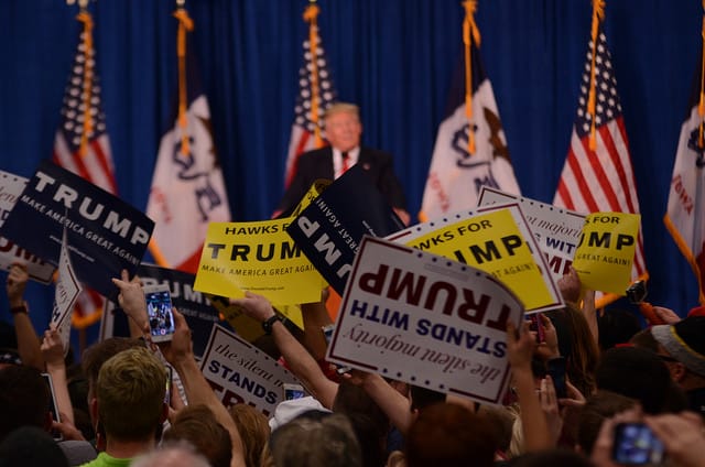 Students show support for Republican Donald Trump at a Jan. 26, 2016, rally in Iowa City, Iowa.