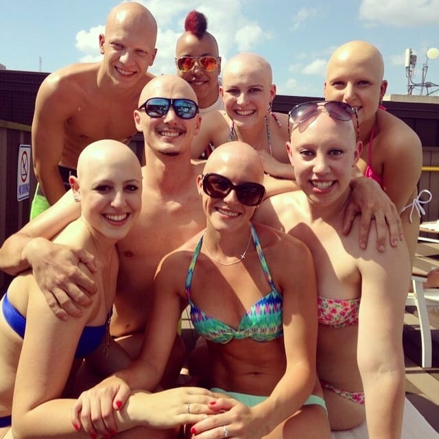 Taylor Goggin (front, center with sunglasses) and others from across the country with alopecia, during fun time in June 2014 at the National Alopecia Areata Foundation convention in San Antonio.