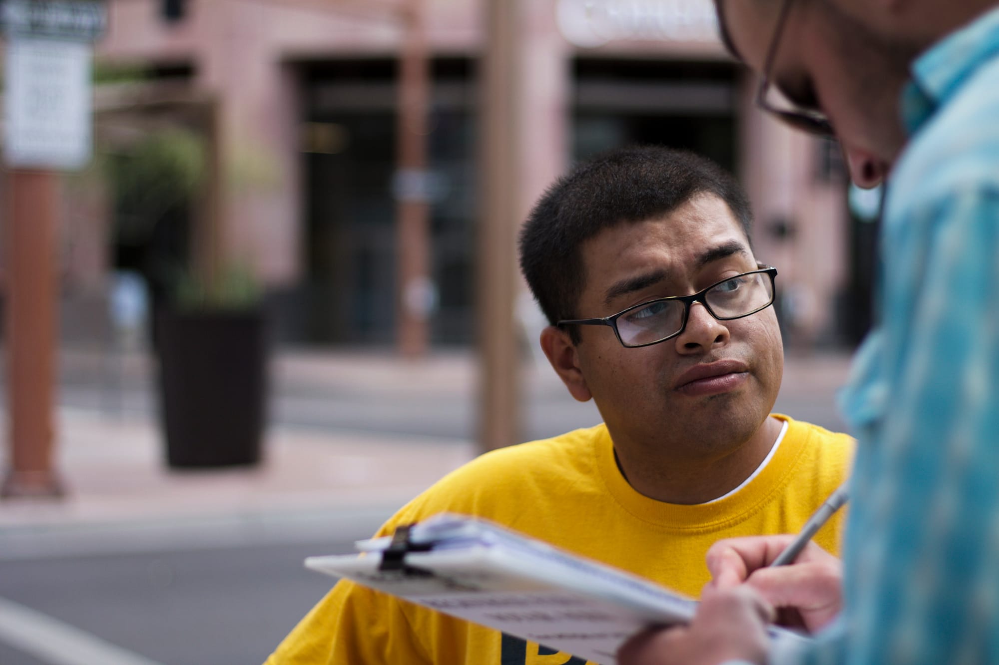 Jose Barboza, a Promise Arizona volunteer, registers voters in Phoenix. Thirteen cases of double voting were prosecuted in Arizona since 2012.