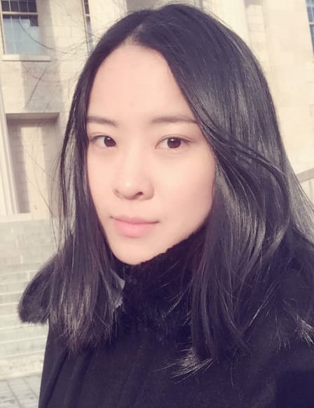 Wanjia Li, University of Iowa student, in front of Old Capitol on Feb. 4, 2016.