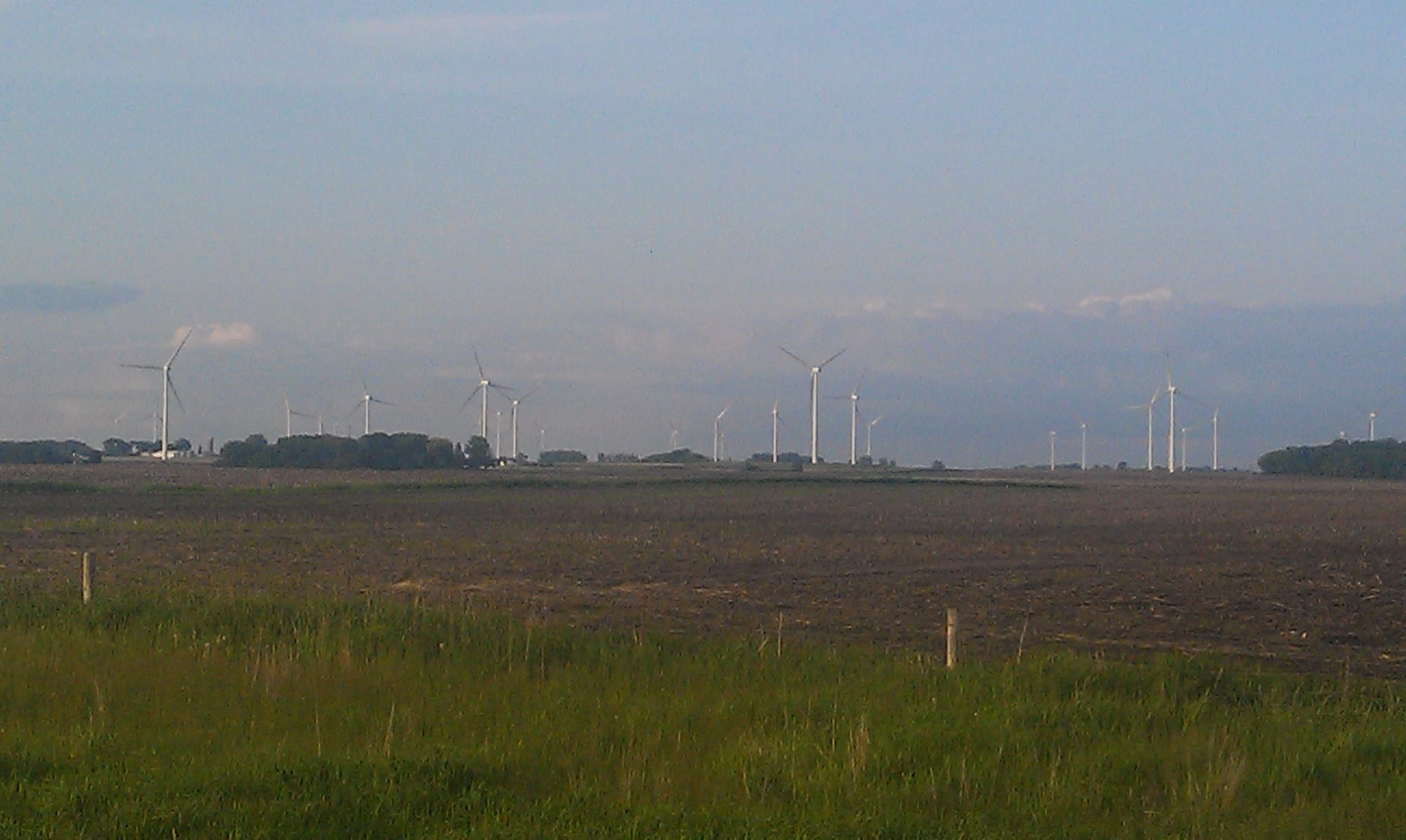 Wind towers dominate the landscape in northern Iowa in this photo, taken off Highway 218 in Floyd County in May 2013.