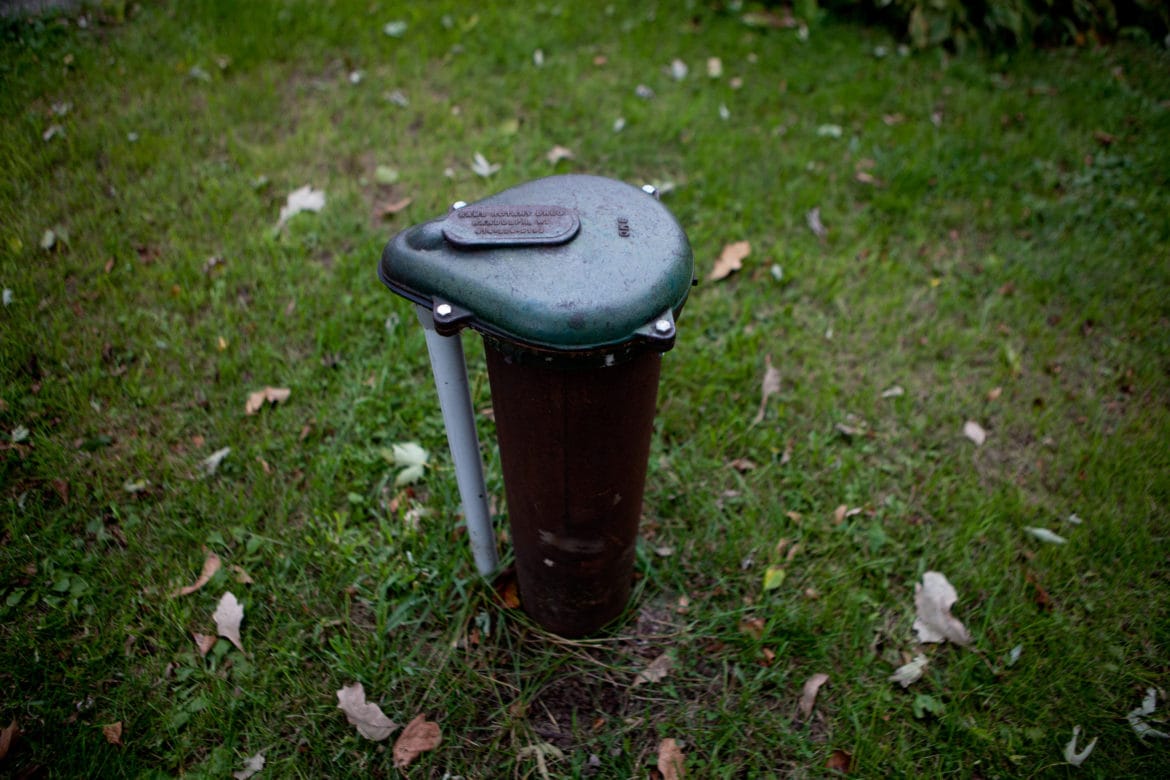 The well in the yard of Doug and Dawn Reeves in rural Stoughton, Wis. In 2014, Doug and Dawn Reeves discovered the well supplying water to their home was contaminated with atrazine, despite the fact that they live in an area where its use has been banned for 20 years.
