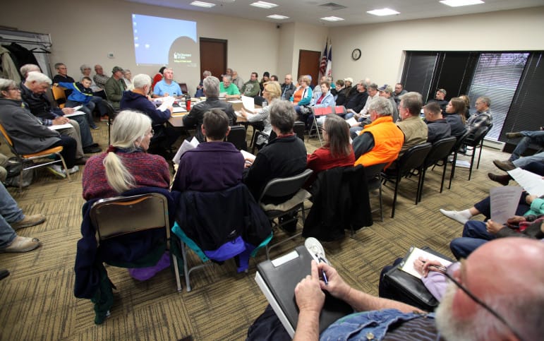 The Mine Reserve Expansion Study Committee meets in the Clayton County office building in Elkader, Iowa, on April 28, 2016. The committee was formed to determine the environmental, economic and aesthetic impacts of Pattison Sand's proposed mine expansion. More than 60 people attended the meeting, where two experts on air quality from the University of Iowa spoke.