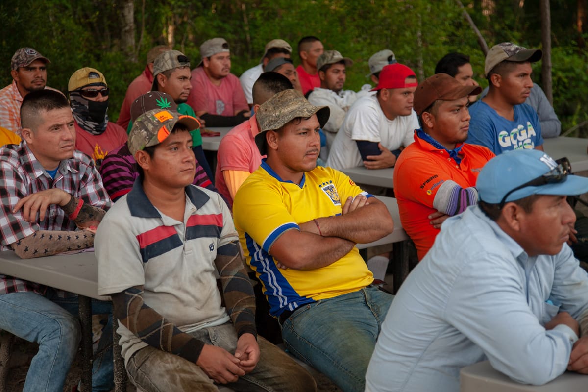 Workers and supervisors at a Fair Food Program education session