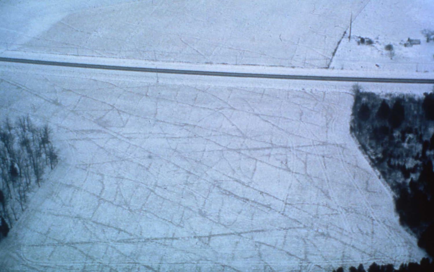 Crevices in this frozen Door County farm field illustrate the groundwater’s vulnerability. Water travels so fast through cracks in the bedrock that it gets to the aquifers before any pollutants in it can be filtered.