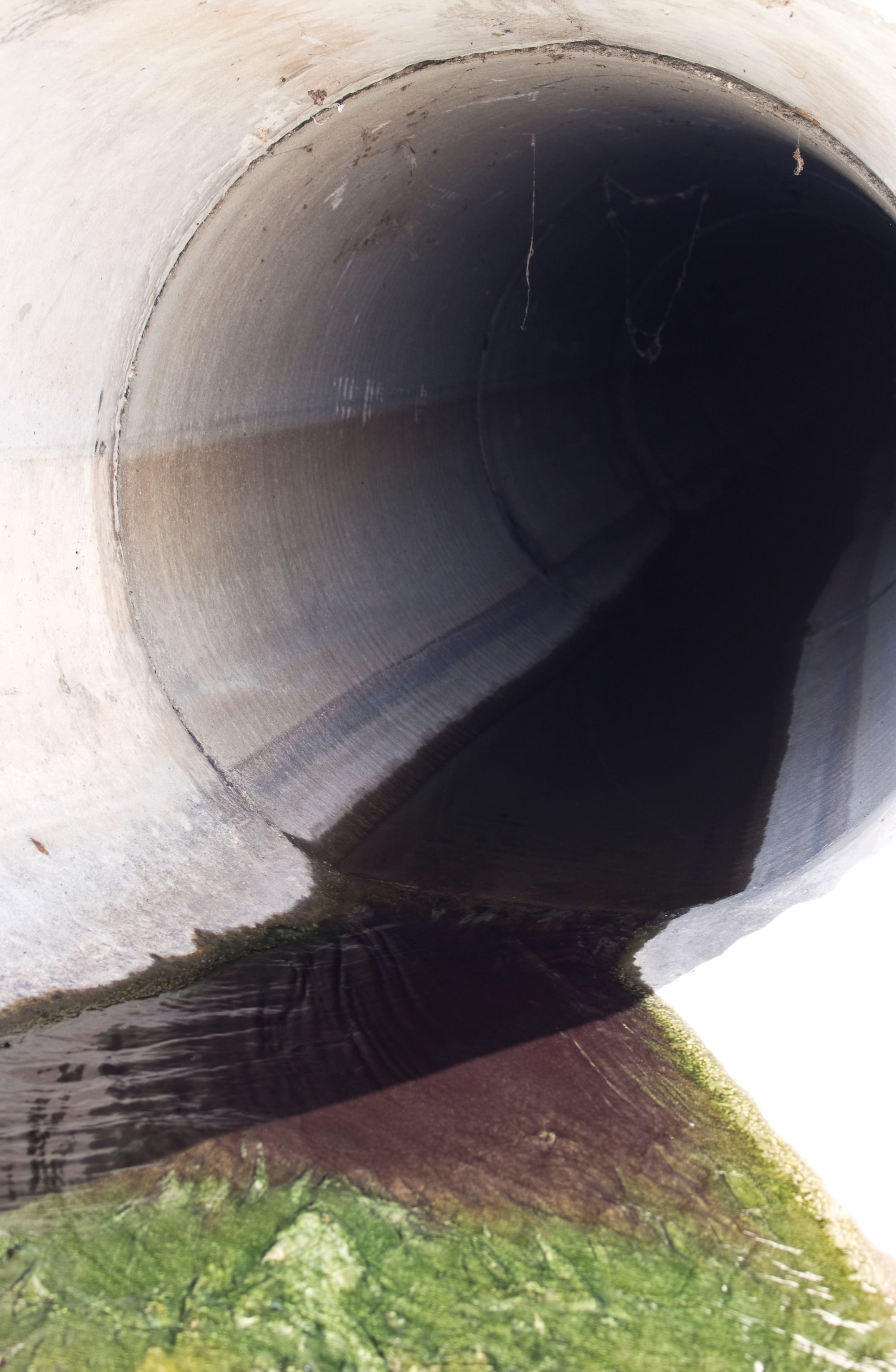 While nonpoint-source pollution includes agricultural runoff and other forms of diffuse water pollution, point-source pollution is much more direct. An industrial pipe, a single point, sending contaminants into a lake is an example of point-source pollution.