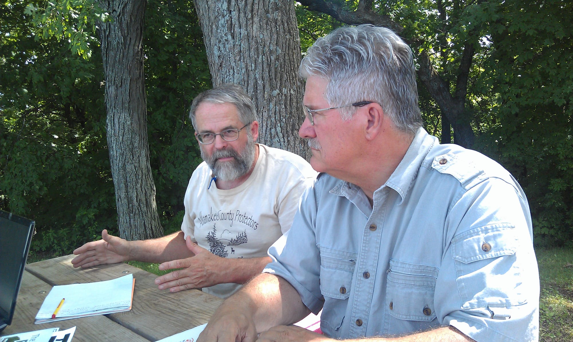 Jack Knight (left) and Ric Zarwell, leaders of the Allamakee County Protectors, talk about their efforts to restrict frac sand mining in their county.