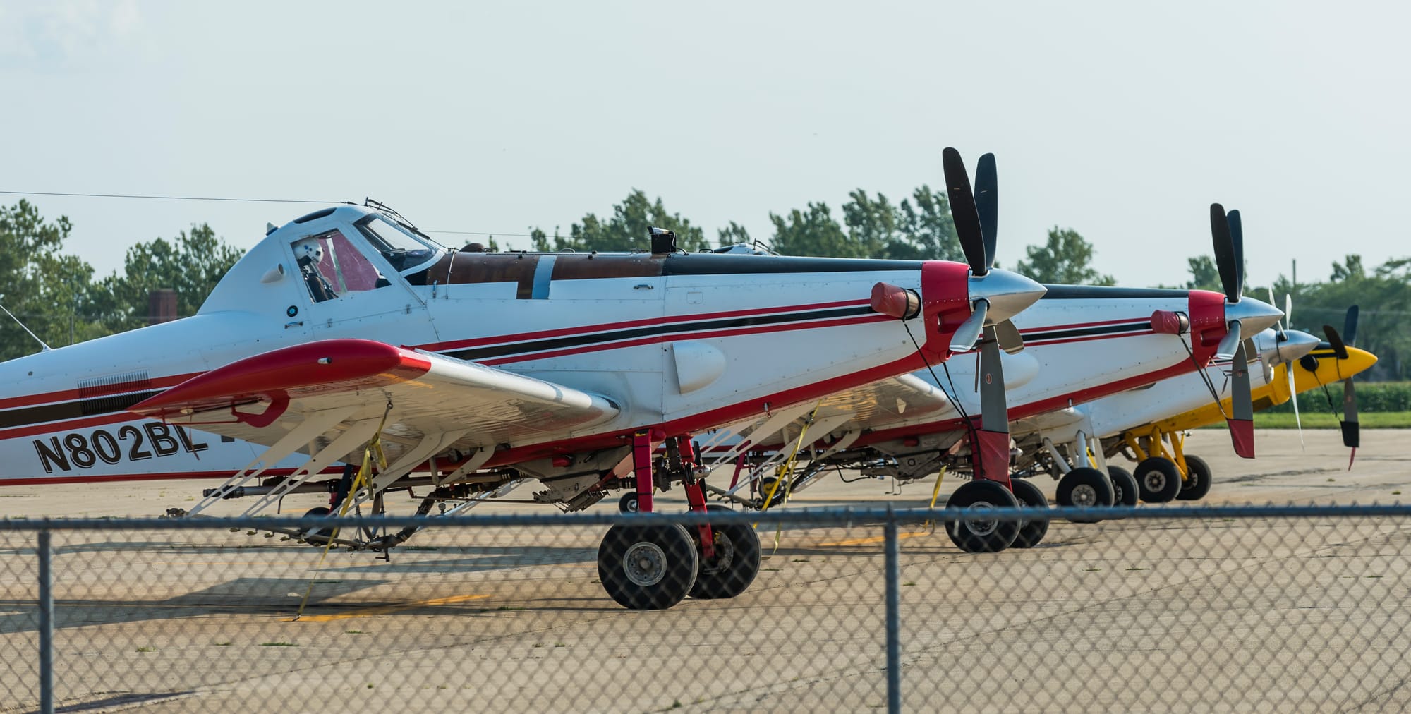 Agriculture planes park at an airport in Rantoul on July 29, 2014. The Environmental Protection Agency is reviewing its standards on protections for farmworkers from pesticides.