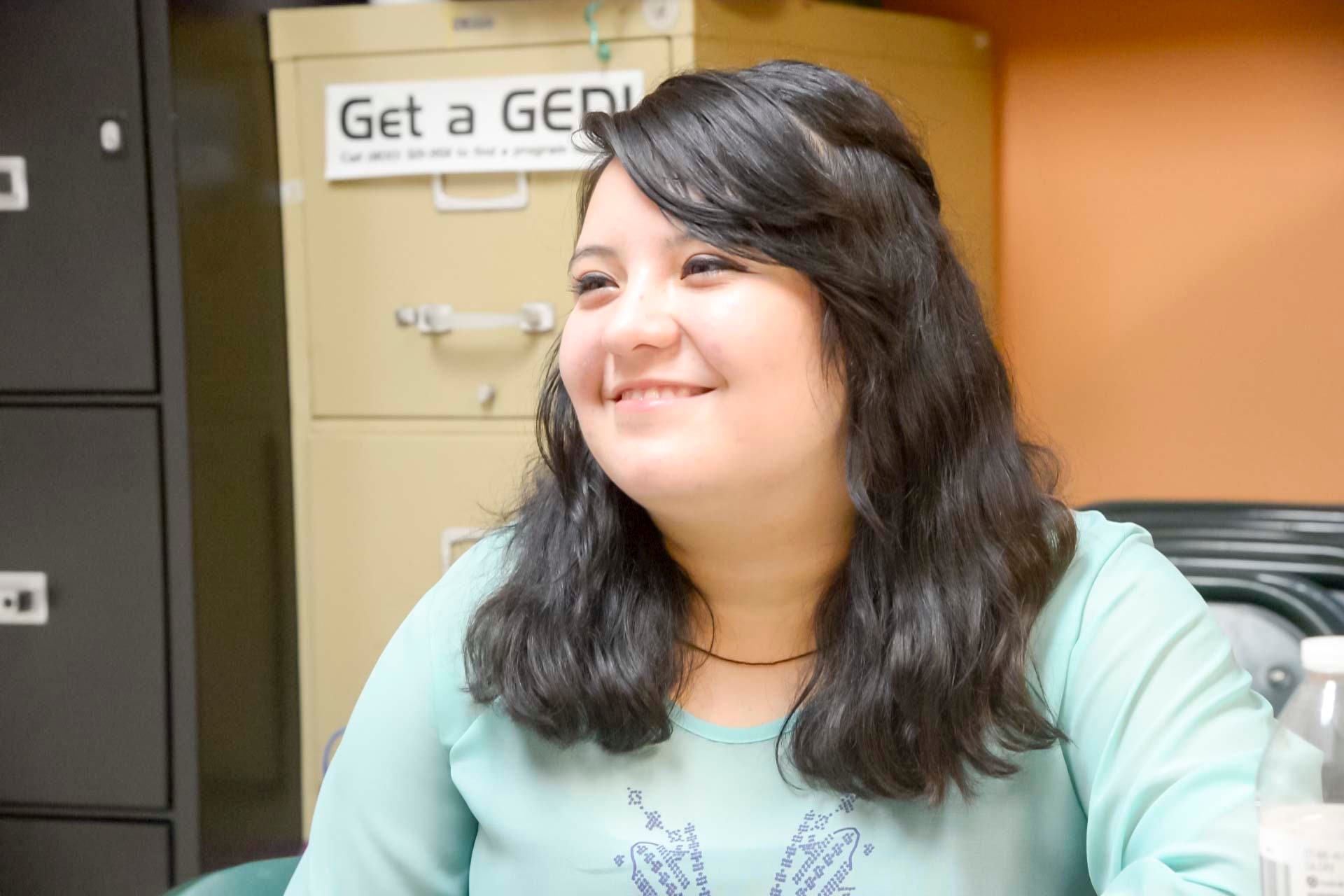 Frida Arellano talks about her journey to central Illinois on Sept. 14, 2015. Arellano, who ended up broke and homeless for a time, said she would not have made the trip to Illinois if given a second chance.