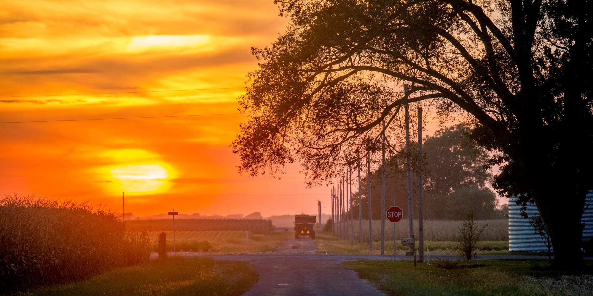 The sun sets on a rural central Illinois road on Sept. 24, 2015.
