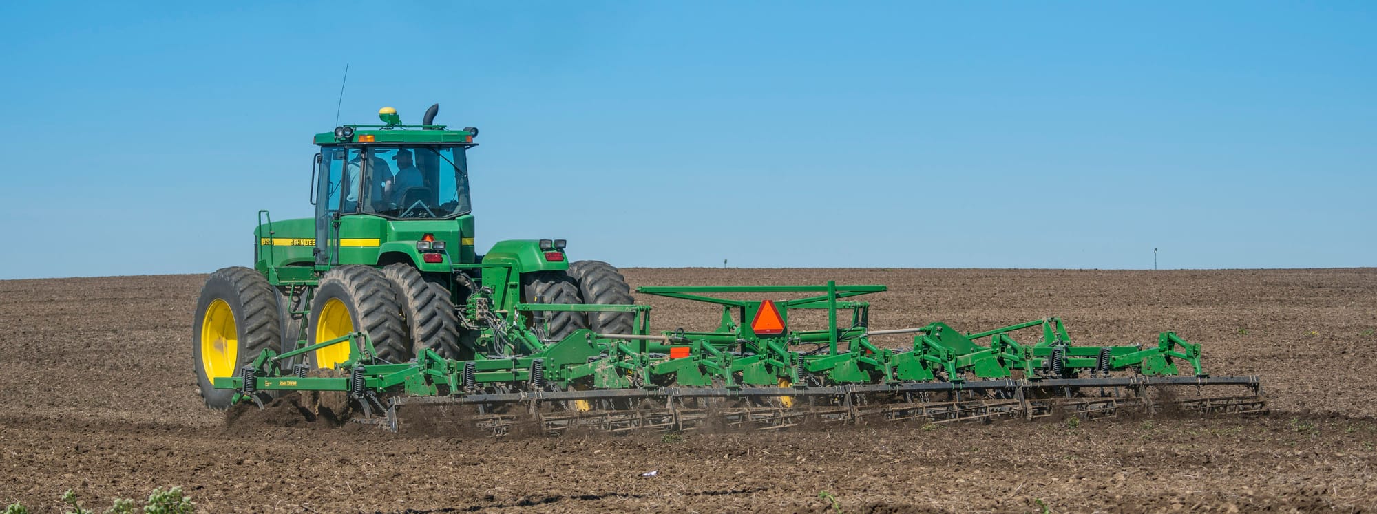 Tilling under a cell phone tower near Illiopollis, Ill., on April 14, 2016.
