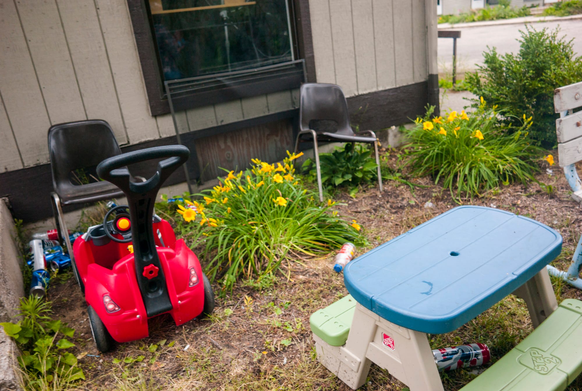 Toys are left outside the Pine Creek housing facility in Holland, Michigan. Farmworkers sometimes travel as families, meaning small children are exposed to the same housing dangers as adults.