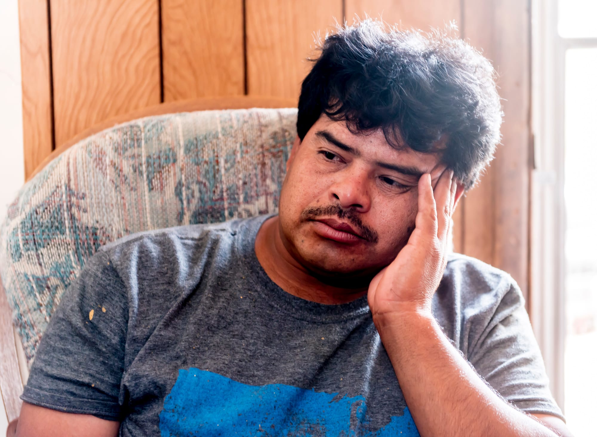 Agustin Chavarria, 41, at his temporary home on an orchard just outside of Lexington, Missouri, on June 22, 2016.