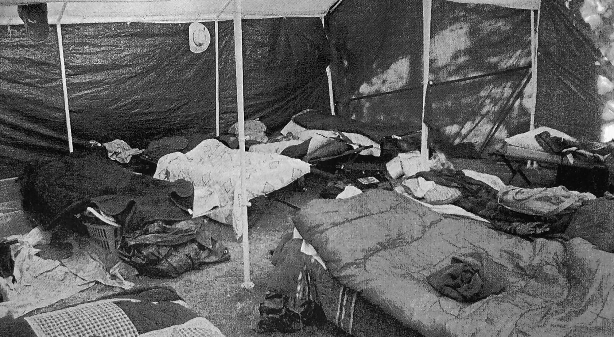 A photo from a 2015 lawsuit related to H-2A farmworker housing in Texas. In a complaint, a farmworker alleged that he "had to cook over a fire on the ground" and at times "sleep in an open-air shack or in a pick-up truck" because proper housing was not provided. Housing is a requirement under the federal H-2A program. 