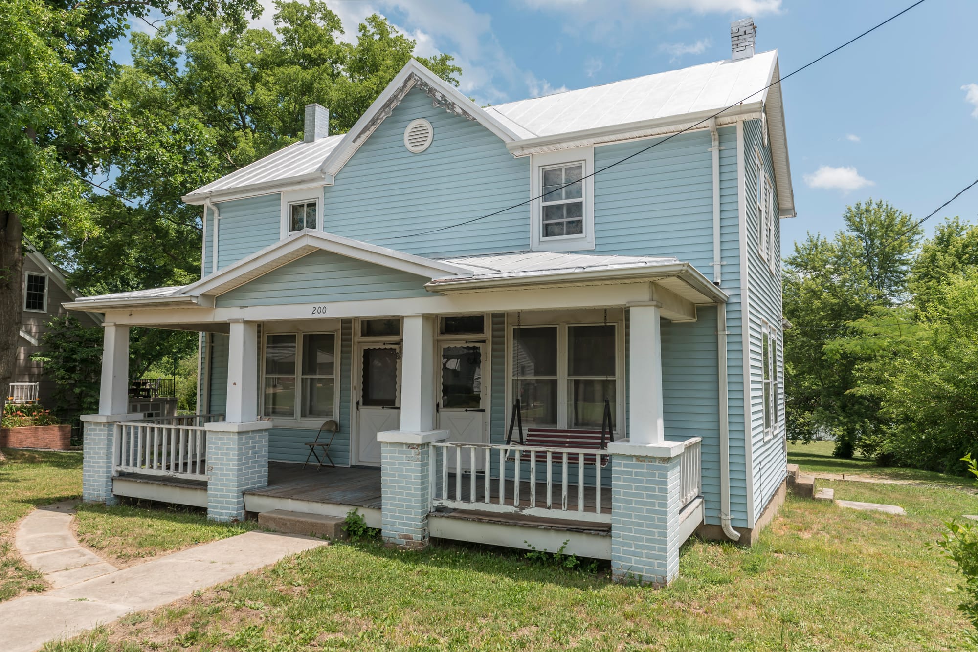 Alvaro Porras Loza, 50, his wife and several others live seasonally in this home in New Haven, Missouri. Photo taken on June 25, 2016.