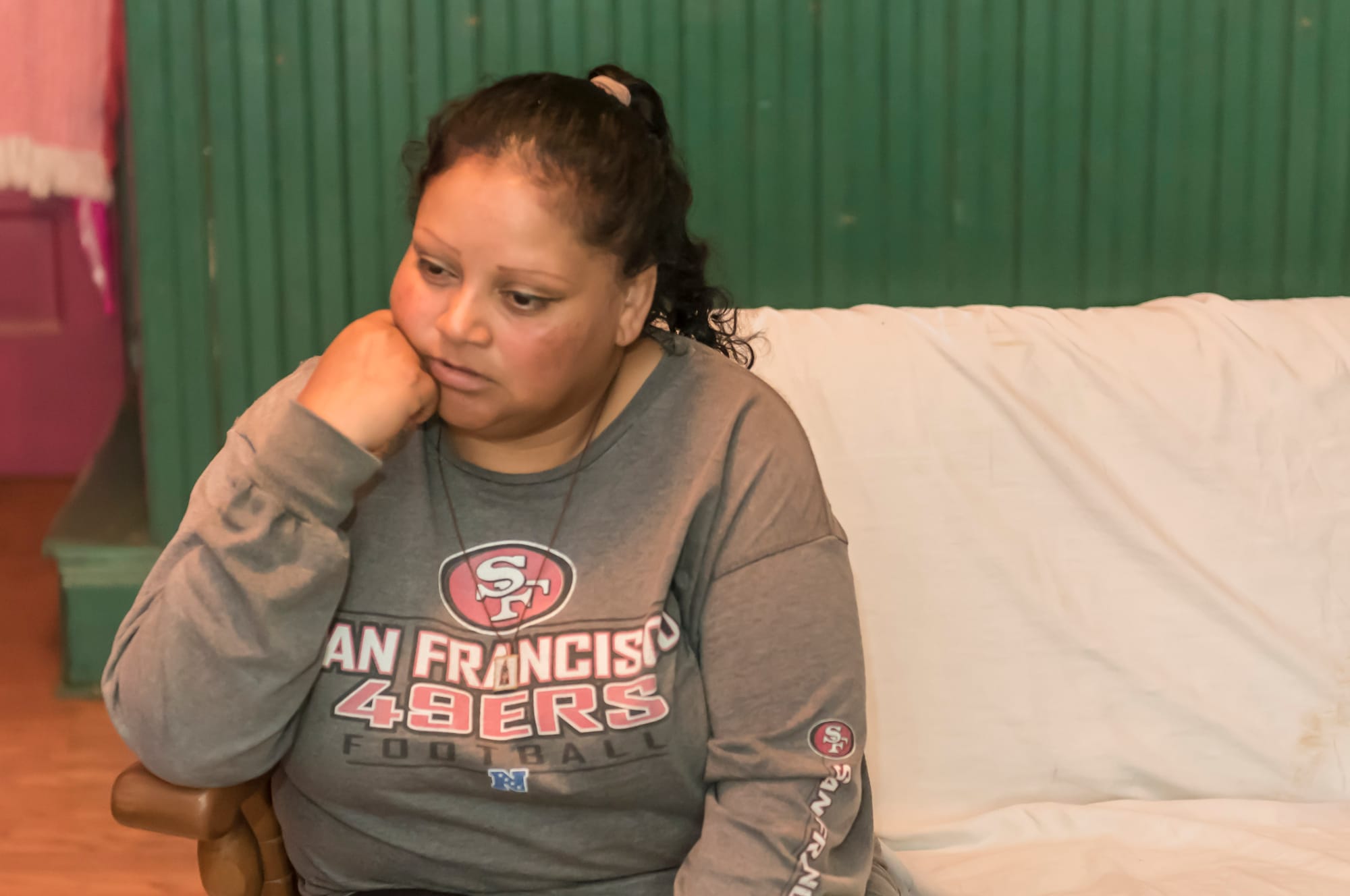 Maricruz Martinez Hernandez, 41, answers a reporter's questions at her seasonal home in New Haven, Missouri on June 25, 2016.